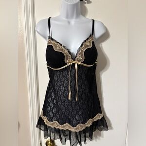 Linea Donatella Black lace babydoll top with beige bow detail. Size: Medium